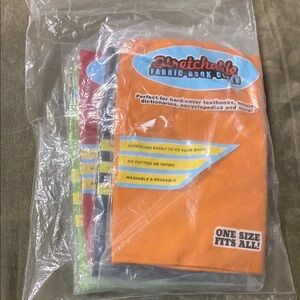 4 Stretchable Fabric Book Covers - Orange, Blue, Green, and Black